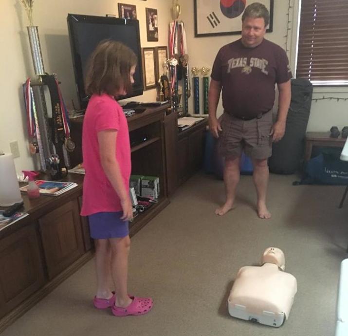 Summer leaderships camps young girl learning CPR