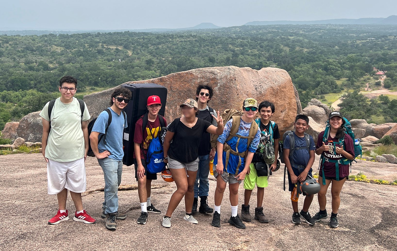 Rock Climbing Campers on top of Enchanted Rock